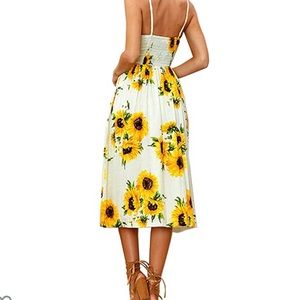 New! Sunflower spaghetti strap dress with pockets.